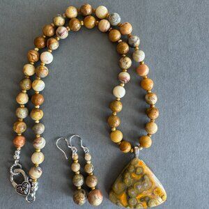Orbicular Jasper Pendant strung with coral fossil beads